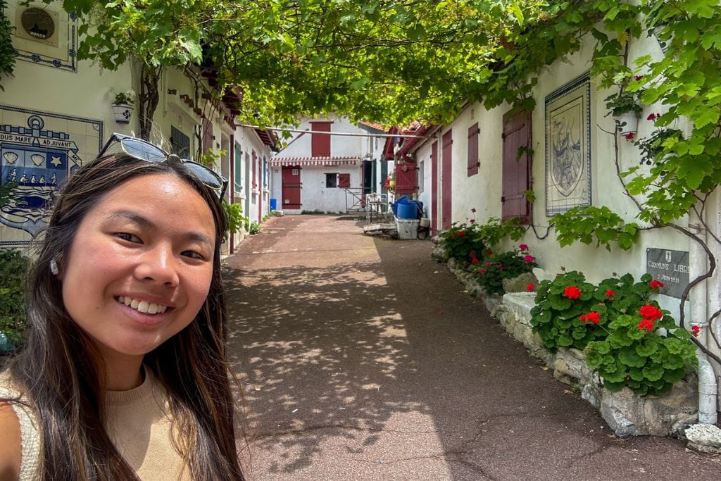 A picture of Kristin exploring the fishermen's housing in Biarritz.