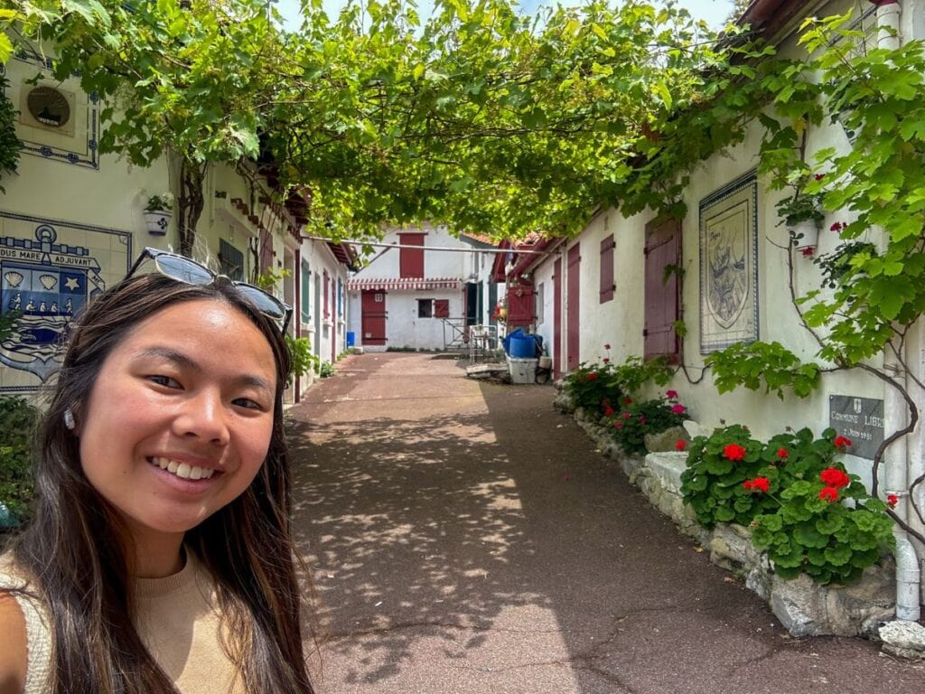 A picture of Kristin exploring the fishermen's housing in Biarritz.