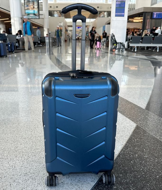 A picture of Kristin's navy blue Silverwood II Travelers Choice suitcase. It's in pristine condition as this picture was taken before the first flight.