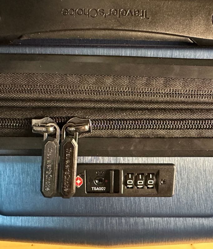 A picture of the built in lock on top of the Silverwood II carry on luggage by Travelers Choice.