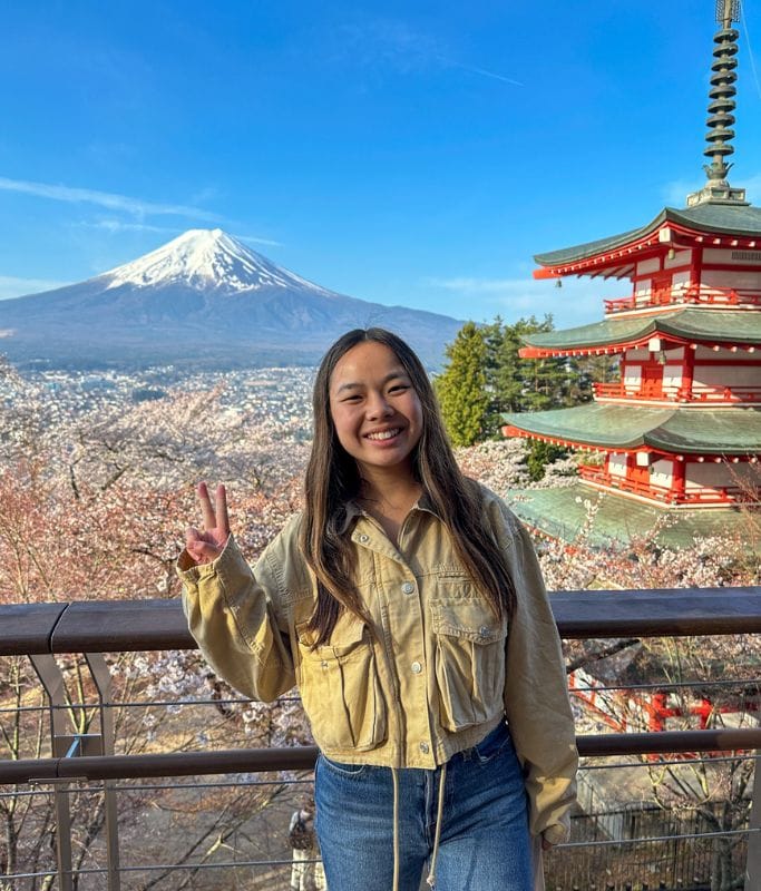 A picture of Kristin at the Chureito Pagoda with Mt. Fuji in the background.