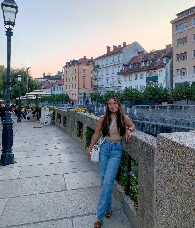 A picture of Kristin standing along the canals in Ljublijana