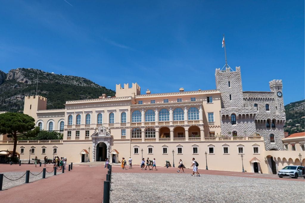 A picture of the Prince's Palace in Monaco. Even though it's not that impressive from the outside, the views next to it are incredible and worth visiting on your Nice to Monaco Day Trip