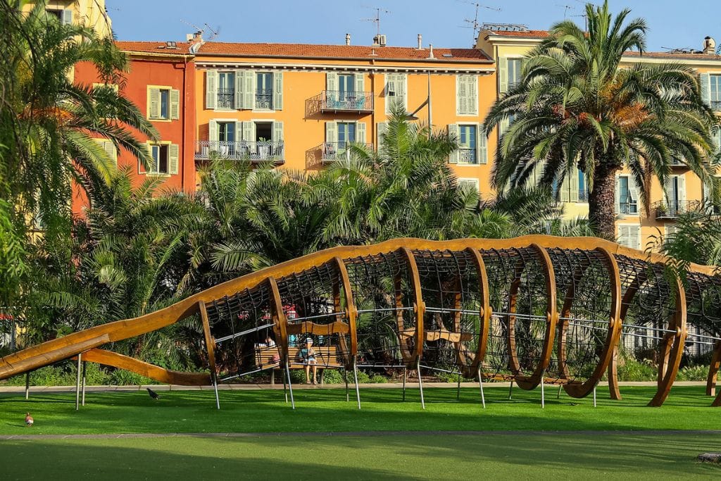 A picture of giant whale structure located within a playground in Nice.