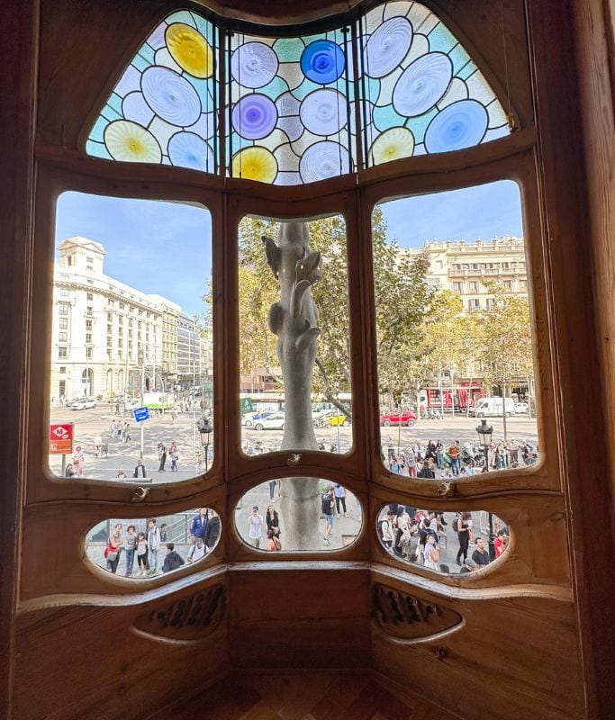 A picture of the giant irregularly shaped oval windows in the main Living room of the Nobel Floor.