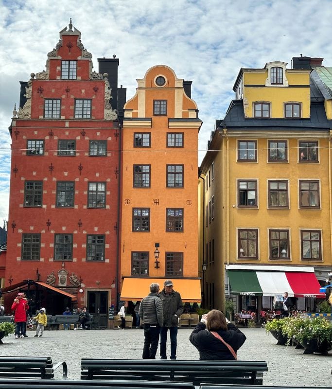 A picture of the colorful buildings in Stortget in Stockholm, Sweden.