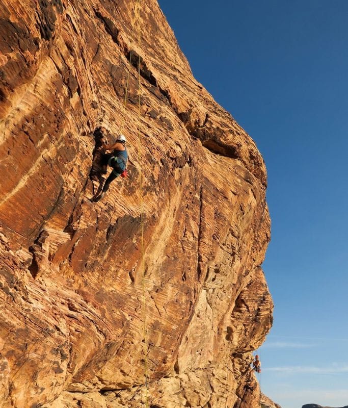 A picture of Kristin mid climbing on another route in Red Rock Canyon.