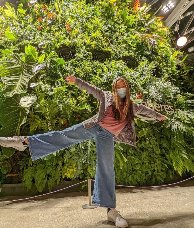 A picture of Kristin inside the Amazon Spheres in Seattle.