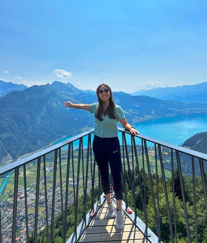 A picture of Kristin standing at the observation point at Harder Kulm.