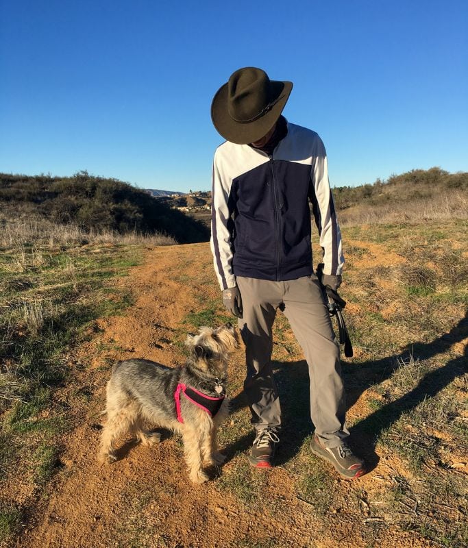 A picture of my dog looking at my dad in Oakmont Park.